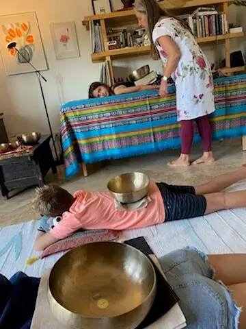 playful interaction of children and adolescents during a sound bath