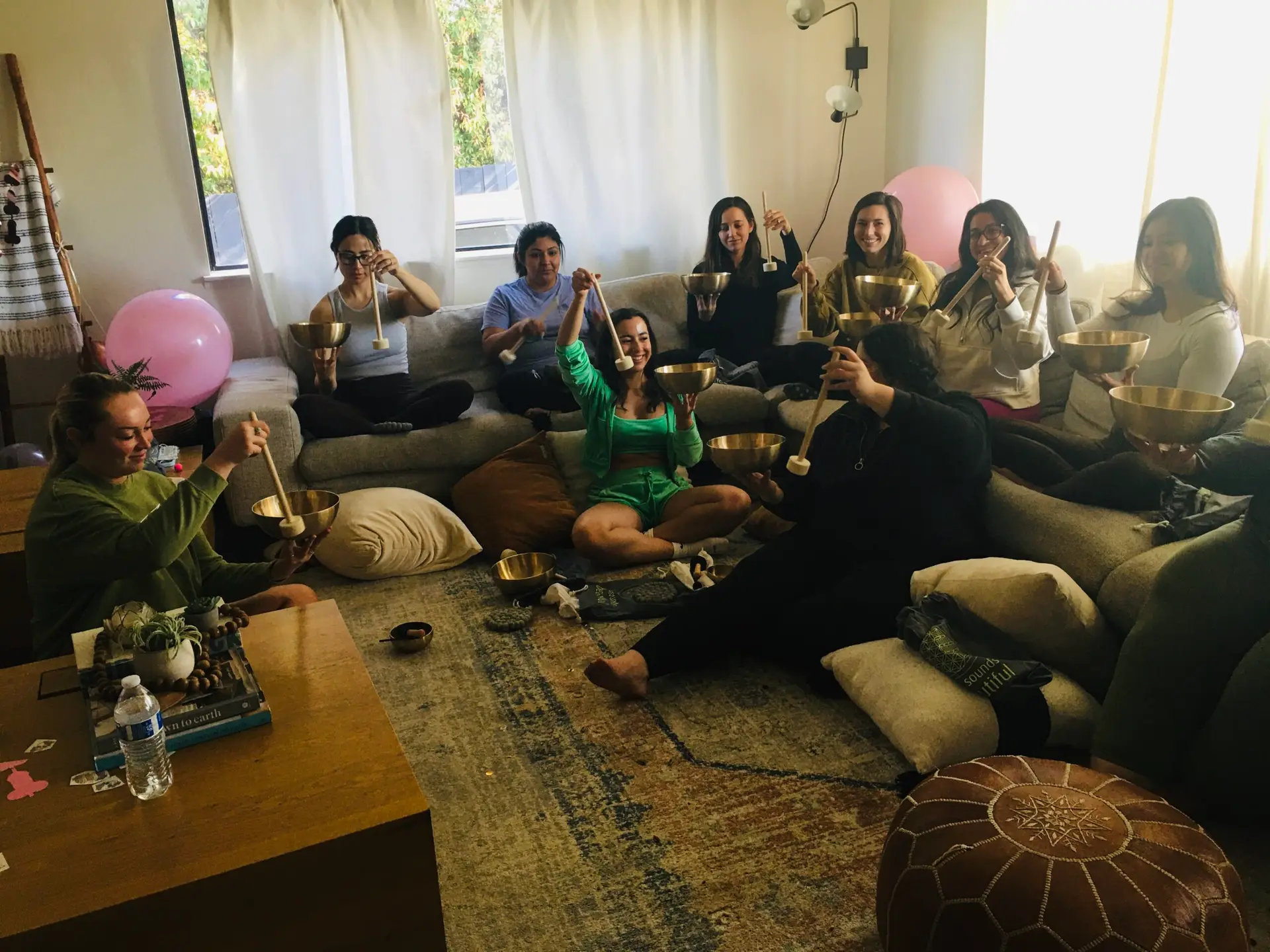 During the bachelorette party young women enjoyed the sound and vibration of the singing bowls