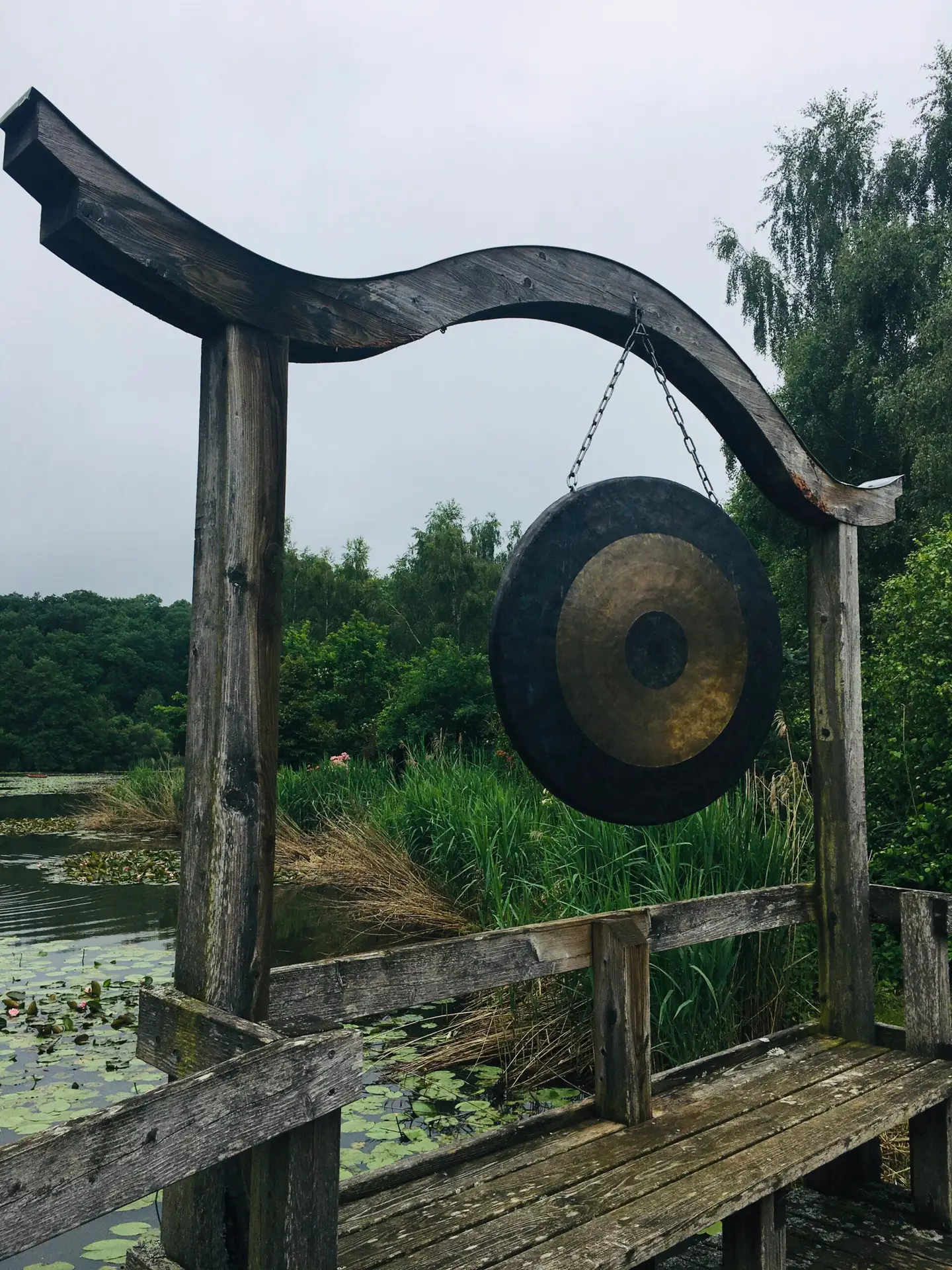 the large gong in the flower garden of a castle in Germany