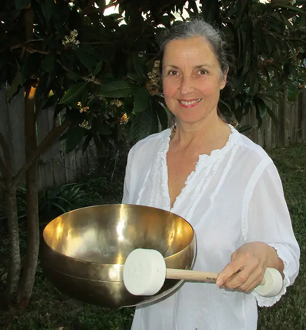 Thea M. Goepfert, PhD playing the singing bowl